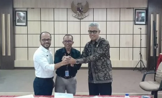 Kepala BPKAD Muaro Jambi Hadiri Rekonsiliasi dan Penandatanganan BAR Pajak Semester I 2025