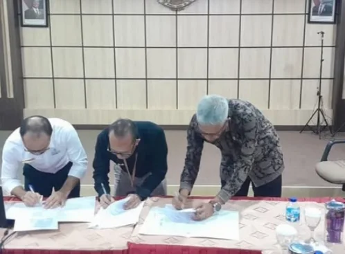 Kepala BPKAD Muaro Jambi Hadiri Rekonsiliasi dan Penandatanganan BAR Pajak Semester I 2025