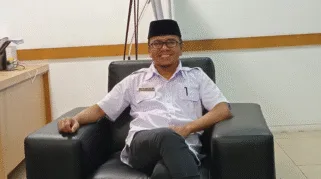 Dr. Fahmi Rasid -Sekretaris PUSDIKLAT LAM Prov. Jambi.