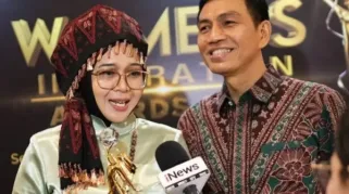 Zulva Fadhil bersama suami Mhd. Fadhil Arief (Bupati Batanghari)