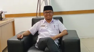 Dr. Fahmi Rasid -Sekretaris PUSDIKLAT LAM Prov. Jambi.